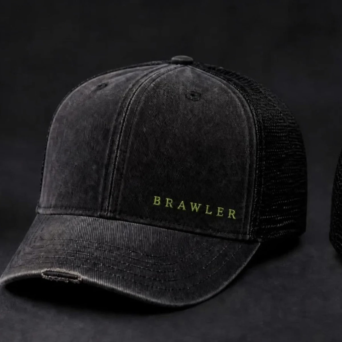 BRAWLER Field Trucker, washed black with lime BRAWLER embroidery, front angle